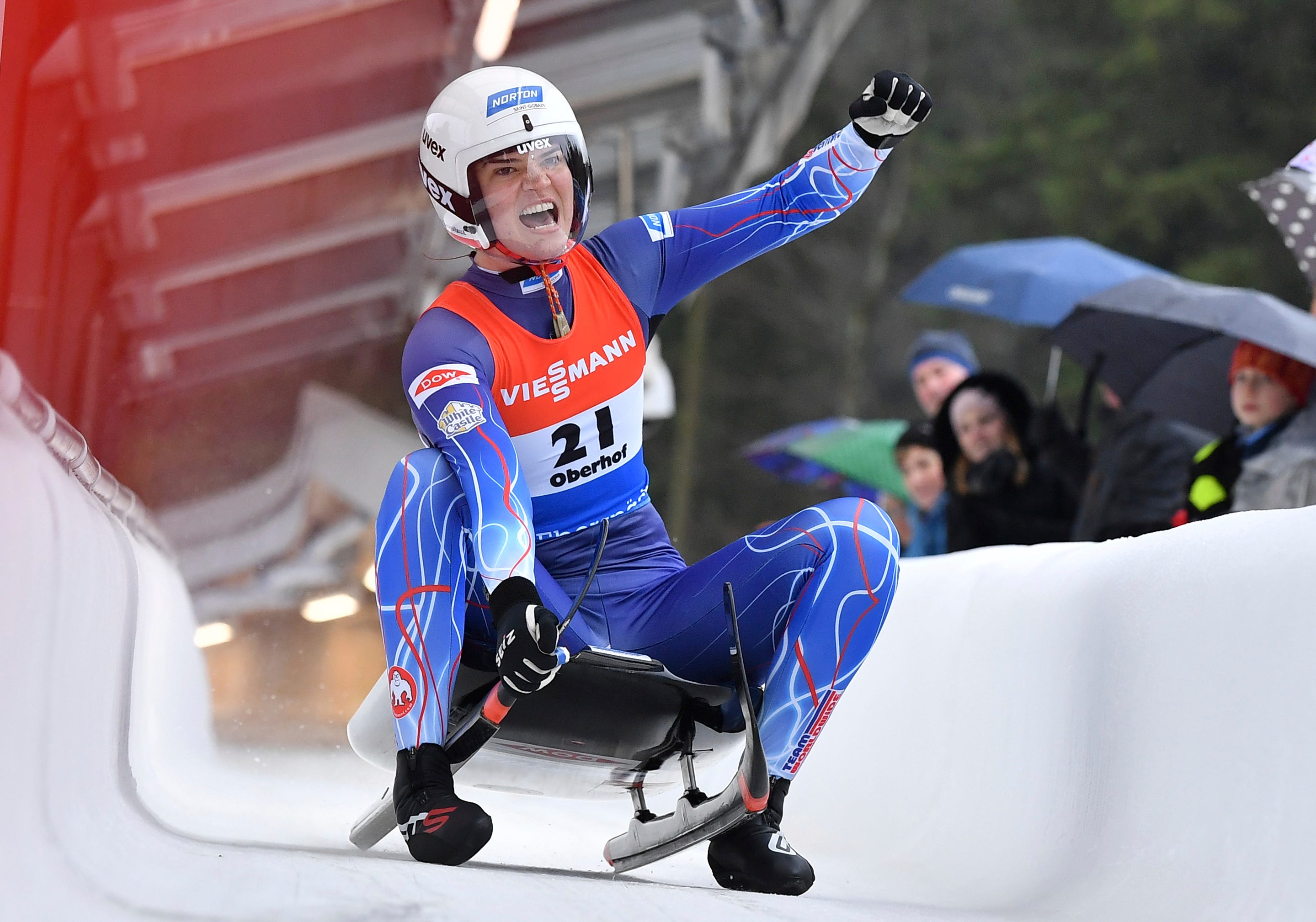 Summer Britcher of Glen Rock, Pennsylvania, cheers at the finish line after finishing third at the luge world cup in Oberhof, Germany, Sunday, Feb.2, 2020.