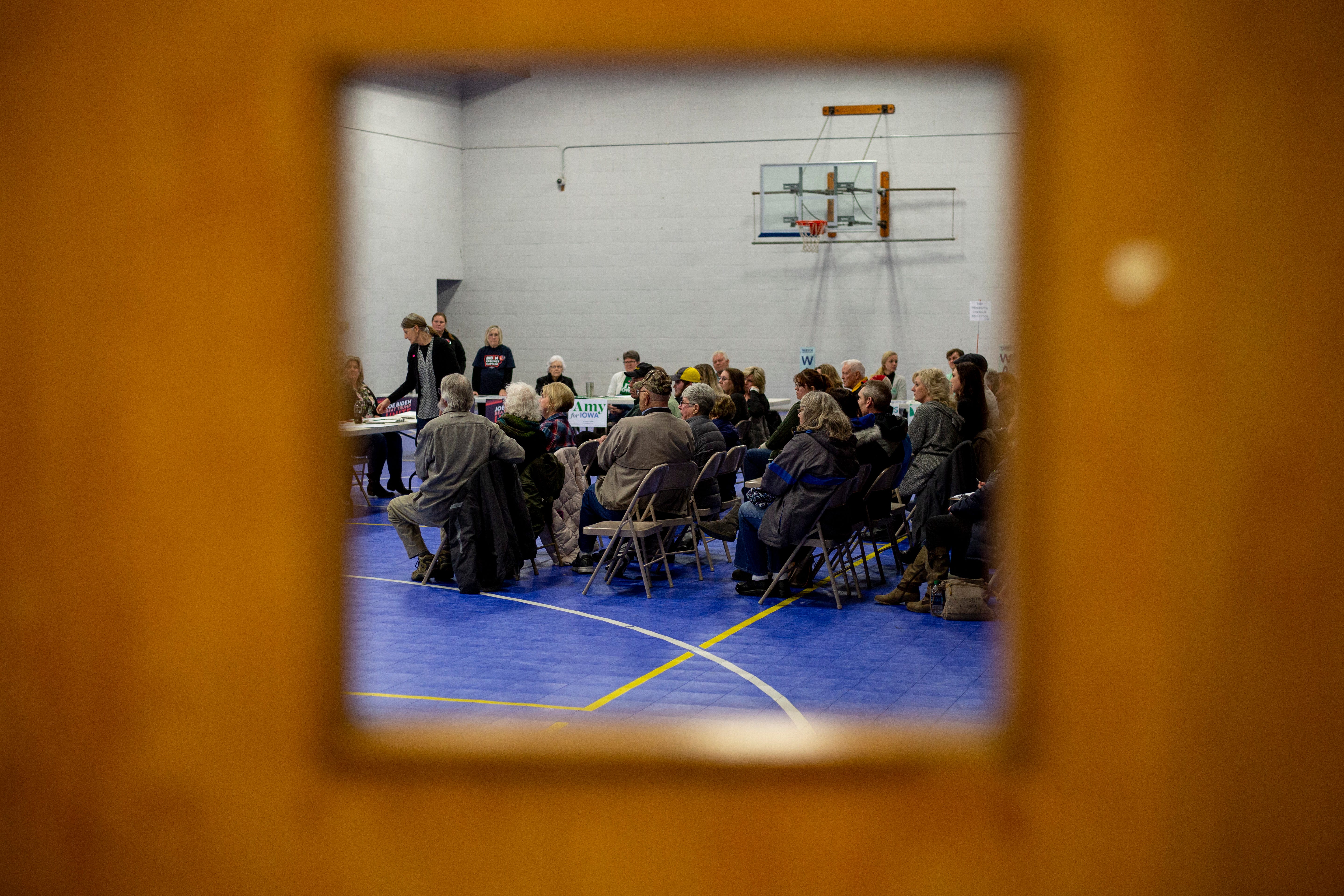 Iowans gather for the Democratic presidential caucus on Monday, Feb. 3, 2020, in Larchwood, Iowa.