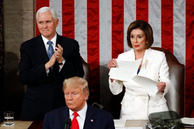 House Speaker Nancy Pelosi of Calif., tears her copy of President Donald Trump's s State of the Union address after he delivered it to a joint session of Congress on Capitol Hill in Washington, Tuesday, Feb. 4, 2020.
