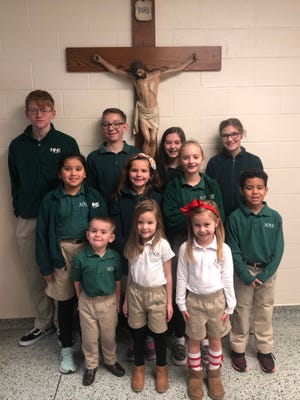 The January 2020 Holy Name Cardinals of the Month are, first row from left, Parker Bryant, Andie Windhaus, and Sloane Koonce. Second row, from left, Jasmine Nicholas, Finley Beck, Bryanna Alvey, and CamRong King. Third row, from left, Sam Long, Garrett Thomas, Paislee LaMond, and Oliva Carr. Cassel Hargitt is not pictured.