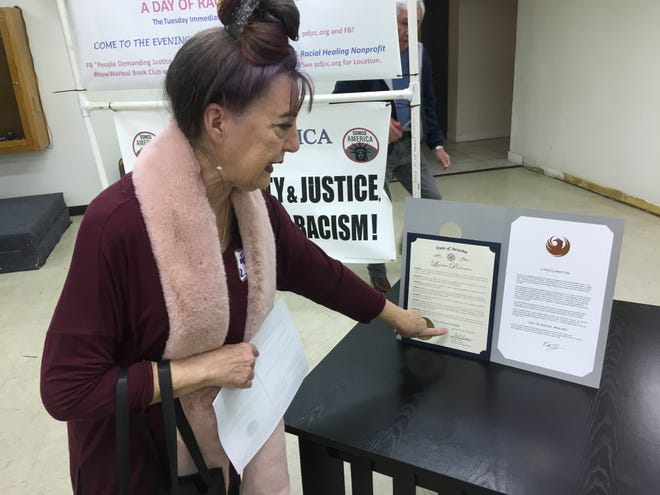 Joanne Scott Woods at Family of Faith Ministries i n Phoenix on Jan. 21, 2020, with the Day of Racial Healing proclamations she helped get passed.