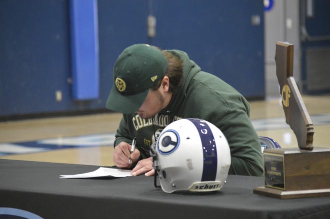Central Valley Christian High School senior Dirk Nelson signs his letter of intent on Feb. 5, 2020 to play college football at Colorado State.