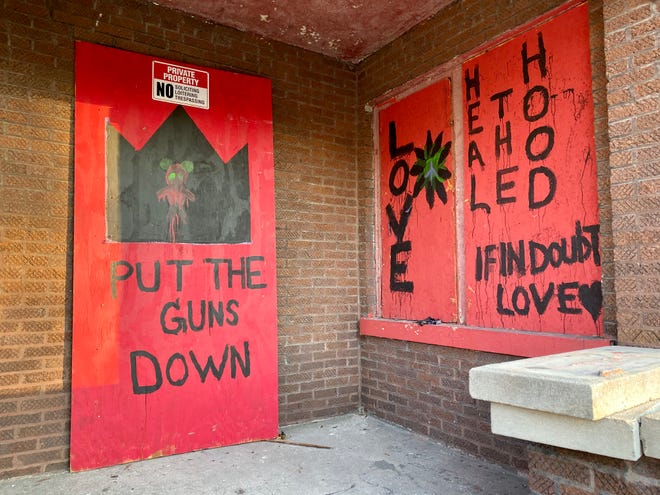 Abandoned homes painted by I Grow Chicago participants in Englewood, Chicago on Nov. 22, 2019.