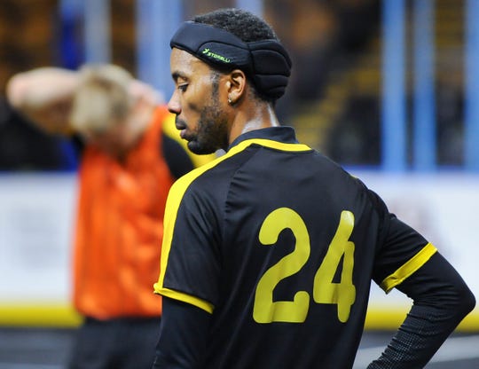 Veteran forward Max Ferdinand takes a breather between drills at Milwaukee Wave practice.