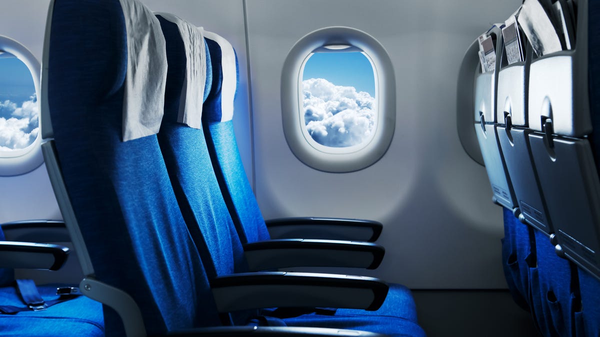 Sanitizing wipes will just dampen fabric seats, so skip them. Instead, pack a washable and reusable seat cover.