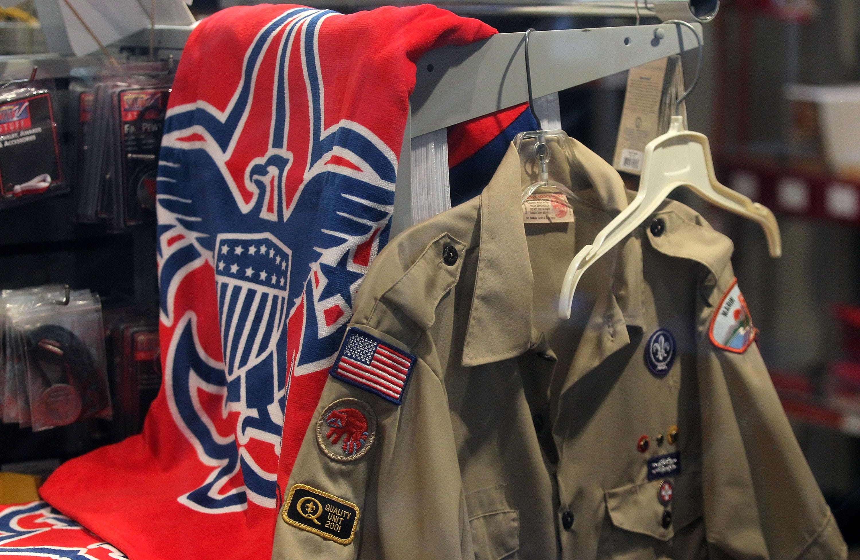 The Boy Scout logo and a uniform are displayed in a store at the Marin Council in Northern California. The scouting movement first made its way to the United States in 1909.