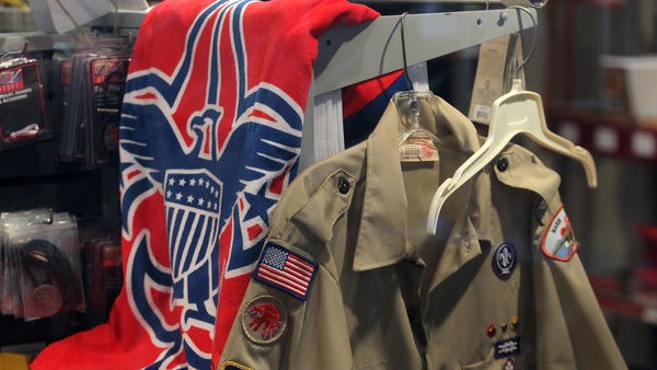 The Boy Scout logo and a uniform are displayed in 