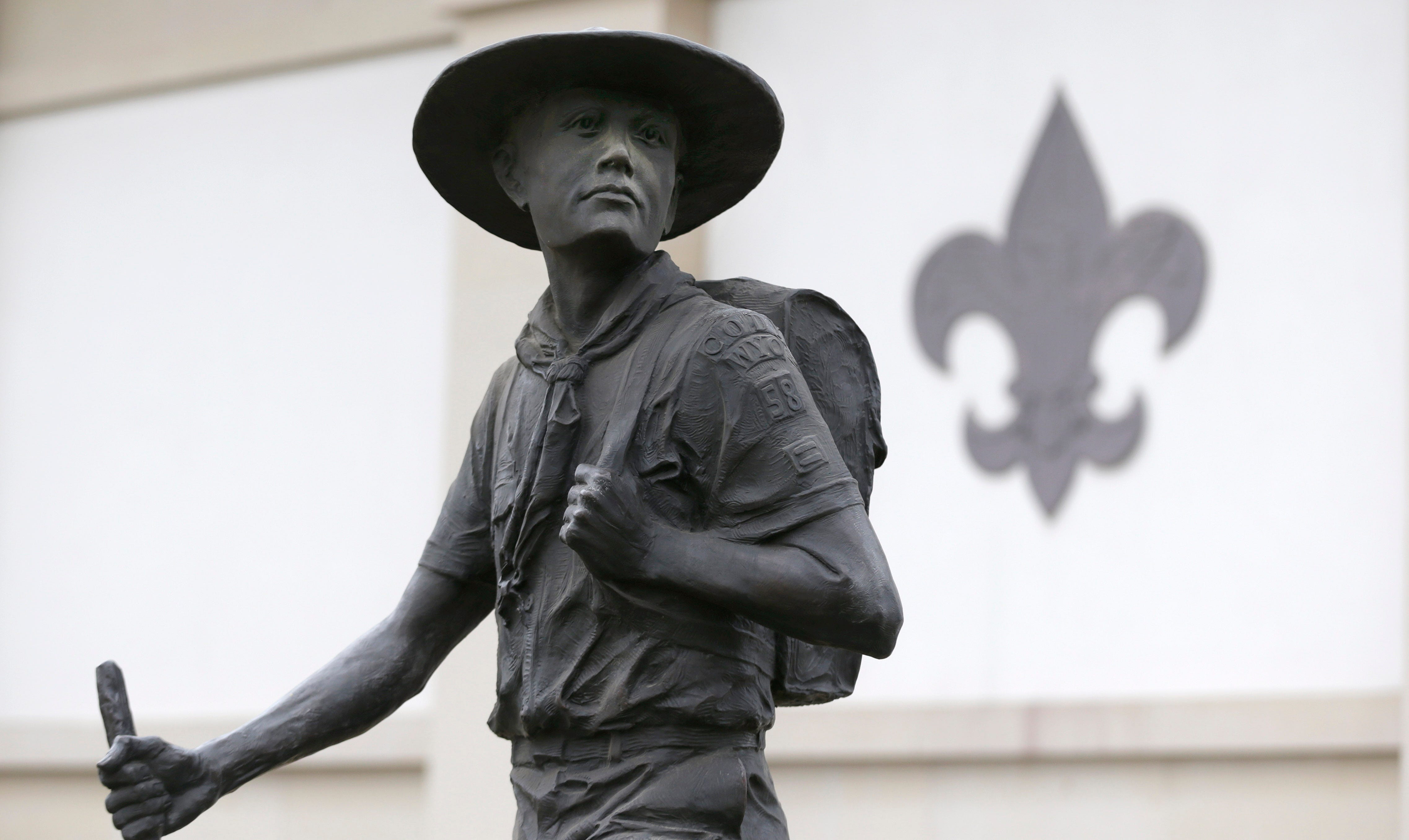 A statue of a Boy Scout in front of the National Scouting Museum at the organization's Irving, Texas, headquarters. Much of Boy Scout property actually is owned by regional councils across the country rather than the national council, which claimed just $240 million in land assets in its 2018 tax filings.