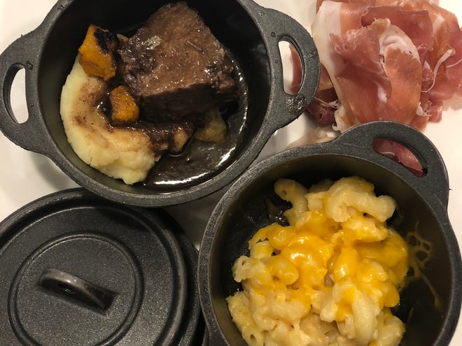 The menu at the Escape Lounge at Sacramento International Airport includes macaroni and cheese, short ribs and other comfort food in appetizer-sized servings. Travelers can buy a day pass.