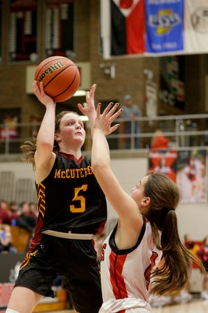 McCutcheon's Teresa Maggio (5) goes up for a layup during the second quarter of an IHSAA girls sectional basketball game, Friday, Feb. 7, 2020 in Logansport.