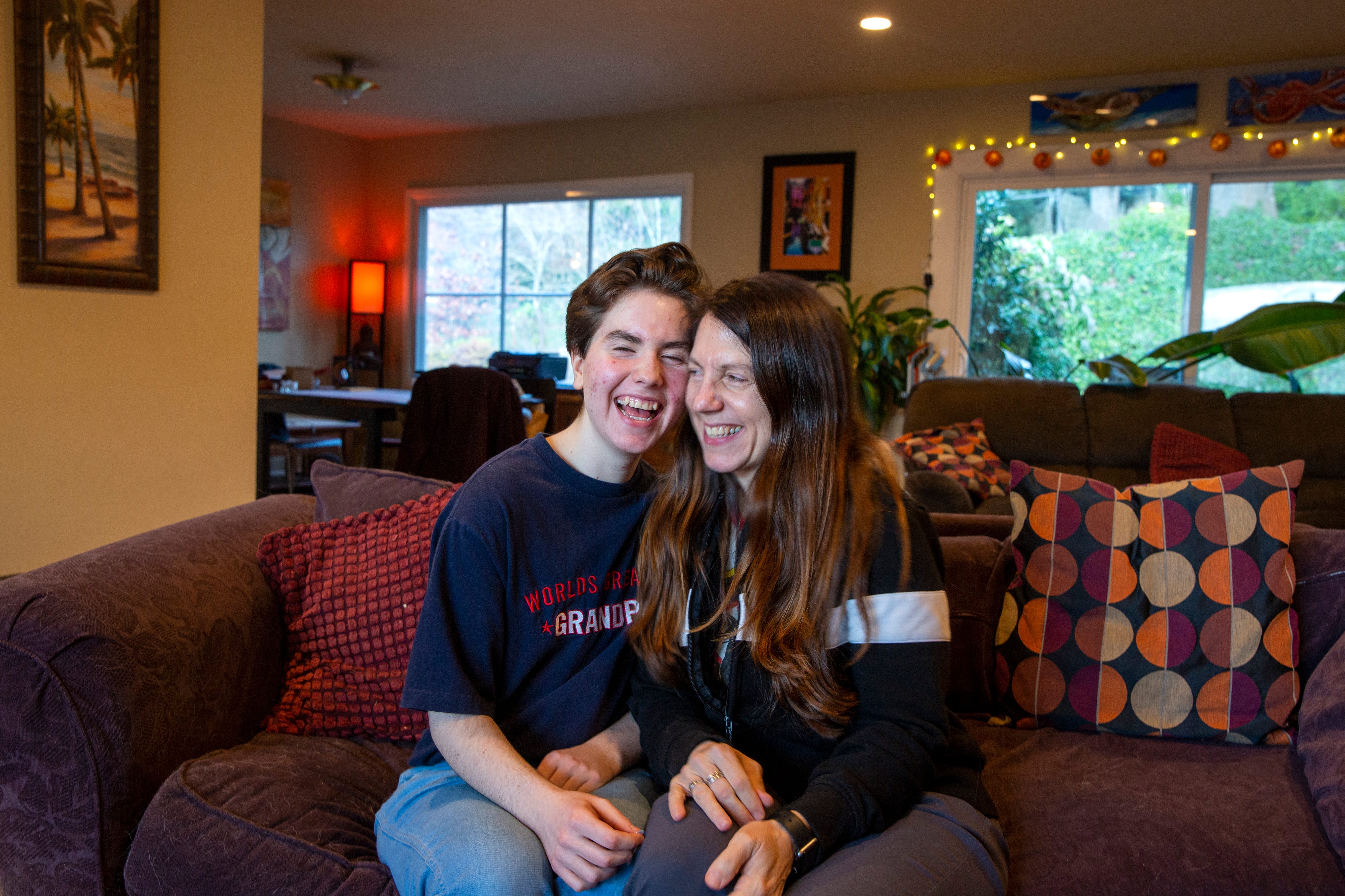 Julian Holman, a transgender student at South Salem High School, started his transition in middle school with the support of his family, including his mom, Karen.