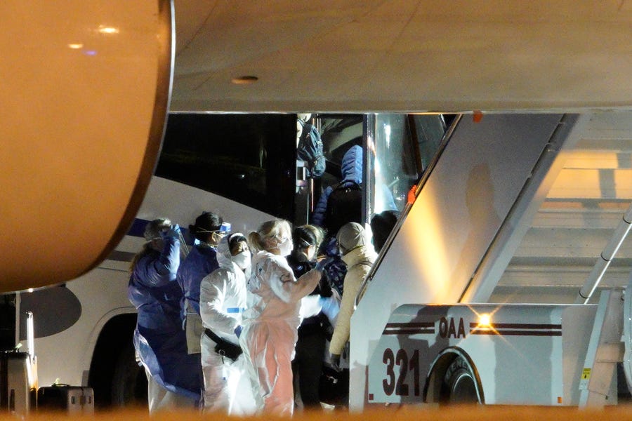 American evacuees from the coronavirus outbreak in China arrives in Omaha, Nebraska, on Feb. 7, 2020.