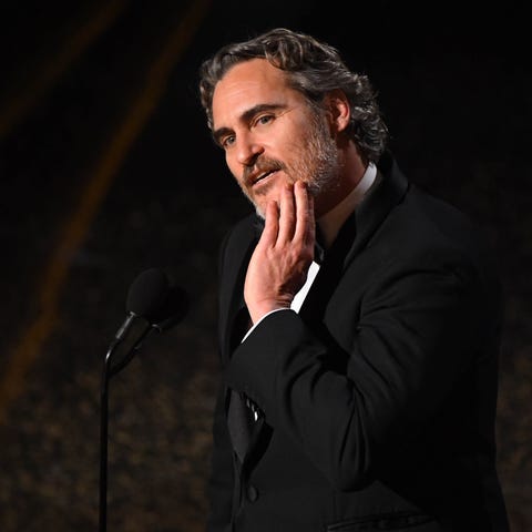 Joaquin Phoenix accepts the award for best perform
