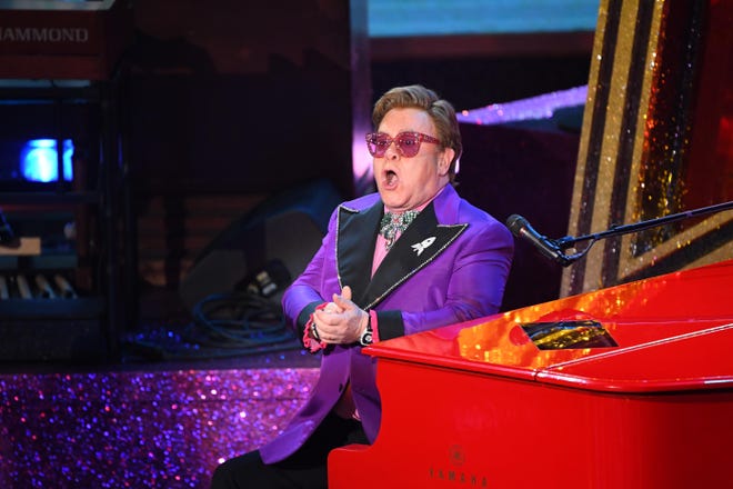 Elton John performs his best original song "(I'm Gonna) Love Me Again" from "Rocketman" during the 92nd Academy Awards.