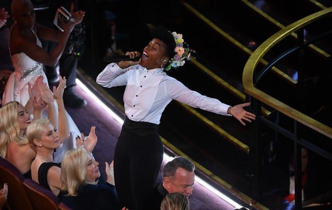 Janelle Monae opened the Oscar telecast with a song honoring the year in film, from 'Midsommar' to 'A Beautiful Day in the Neighborhood.'