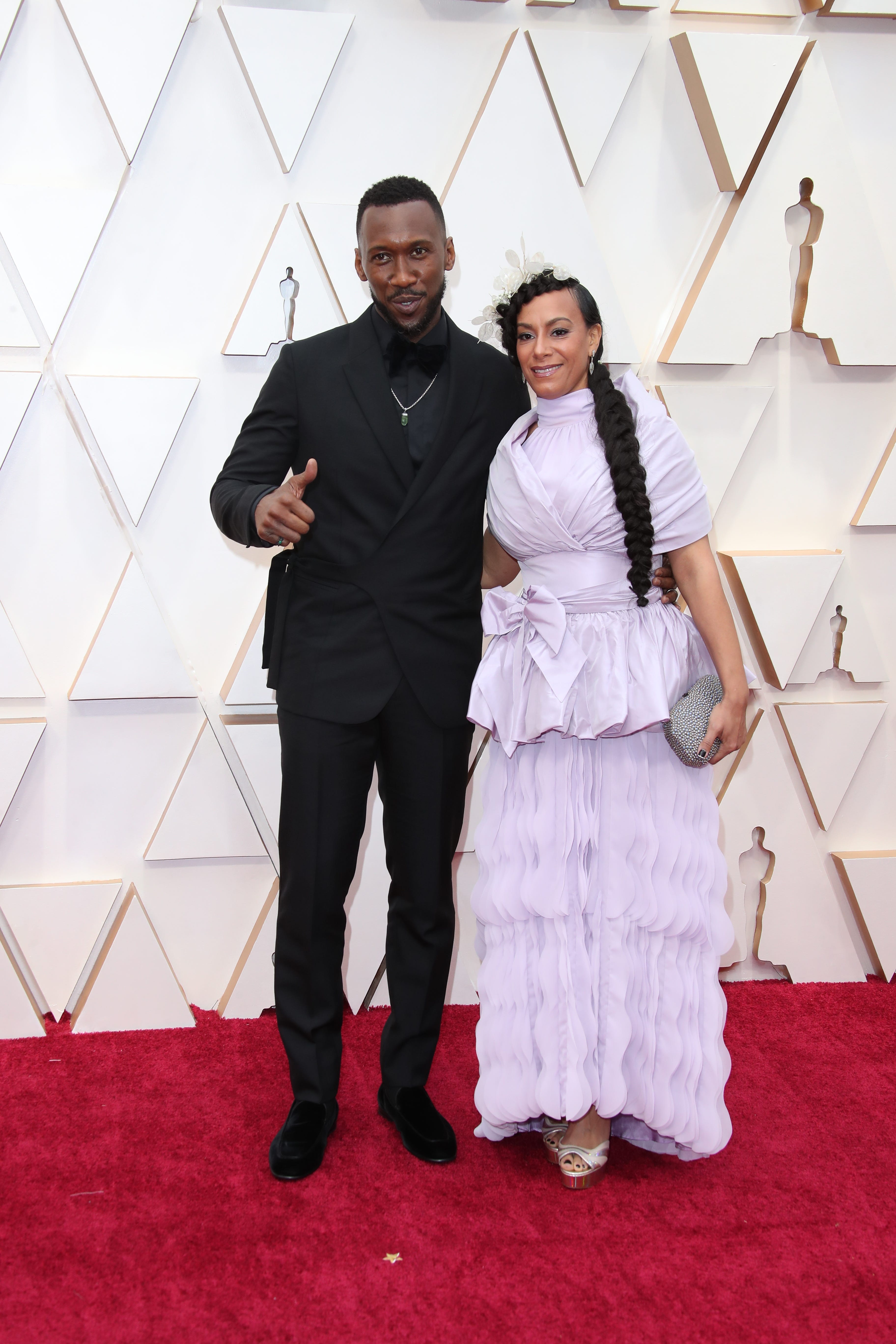 man in a dress at the oscars