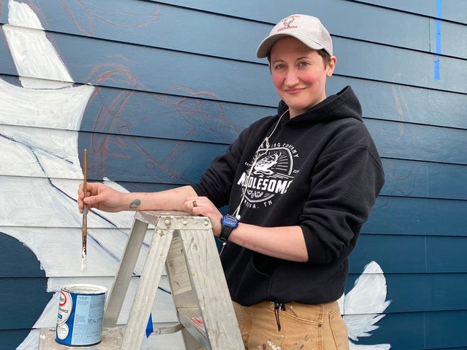 Emily LaForce, a sous-chef at River Oaks, paints murals at restaurants on her days off.