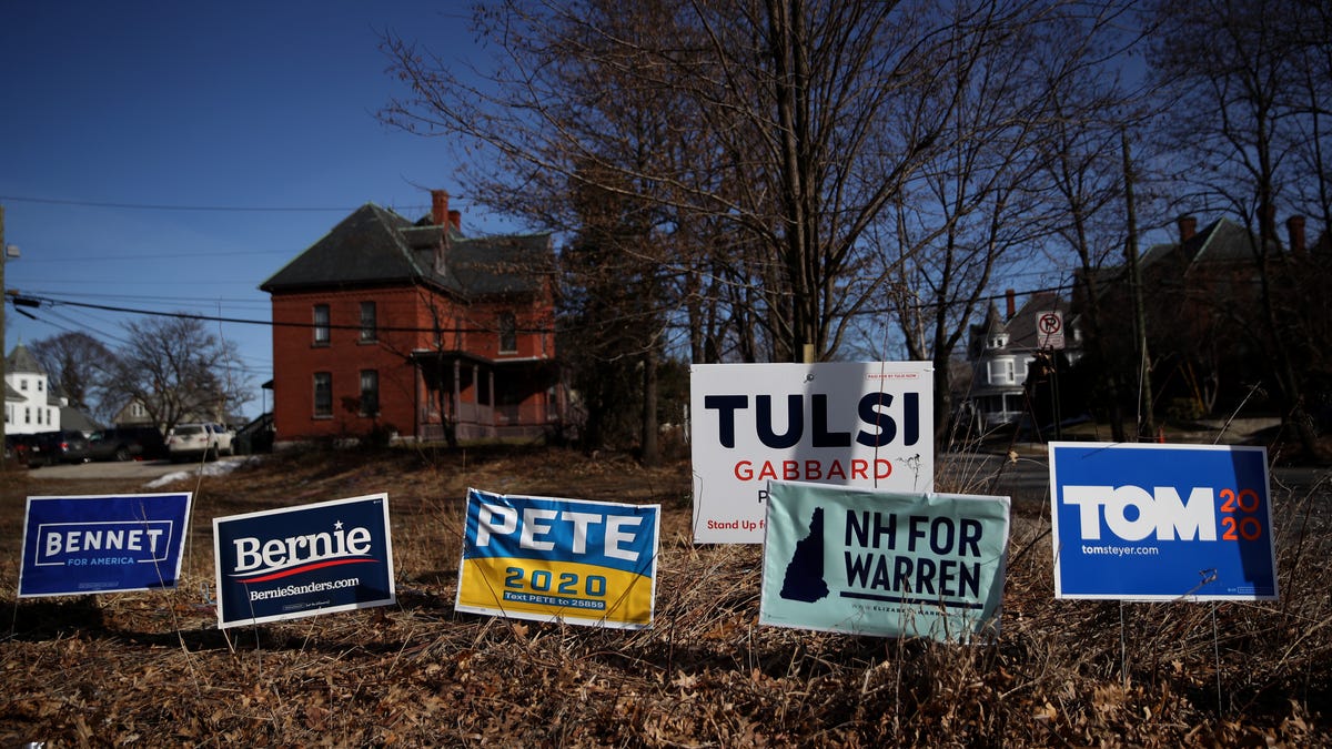 Yard signs for Democratic presidential candidates are posted in front of a home on February 05, 2020 in Manchester, New Hampshire. The New Hampshire primary is on February 11. (Photo by Justin Sullivan/Getty Images)