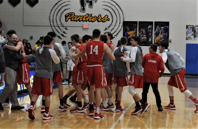 Sheridan celebrates its 71-67 overtime against Maysville on Tuesday, which clinched a share of the Muskingum Valley League title. It's the first league crown for the Generals since they shared with John Glenn in 2010-11.