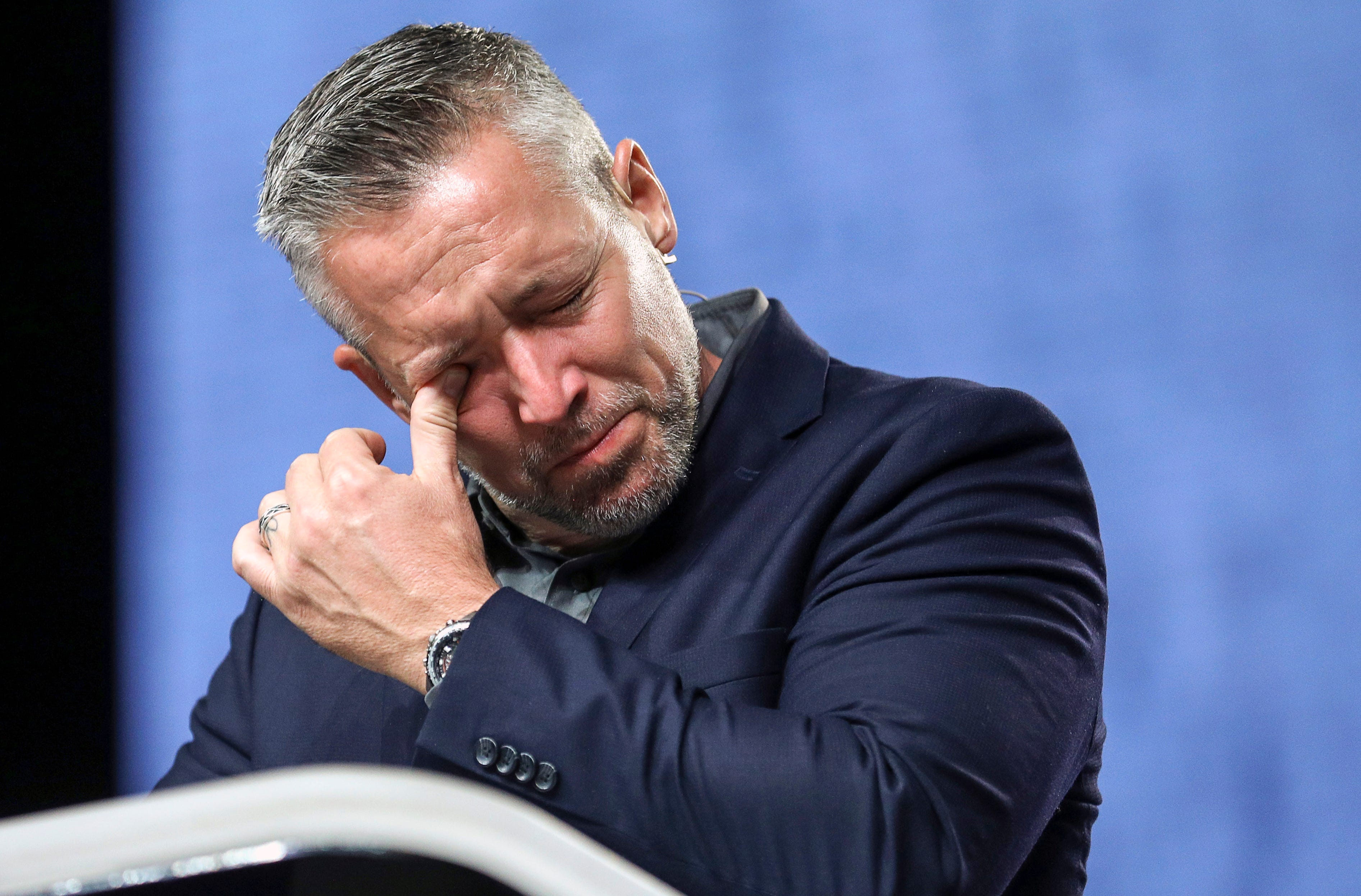 J.D. Greear, president of the Southern Baptist Convention, becomes emotional while talking about sexual abuse within the SBC on the second day of the SBC's annual meeting on Wednesday, June 12, 2019, in Birmingham, Ala. Greear has apologized for the sexual abuse crisis besetting his denomination and outlined an array of steps to address it.
