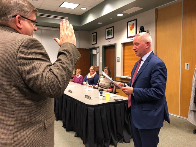 Southern York County school board President Robert Schefter swears in newly-appointed board member John Dorr, Jr. at a special meeting Wednesday, Feb. 12. Dorr previously served on the board from October 2018 to December 2019.