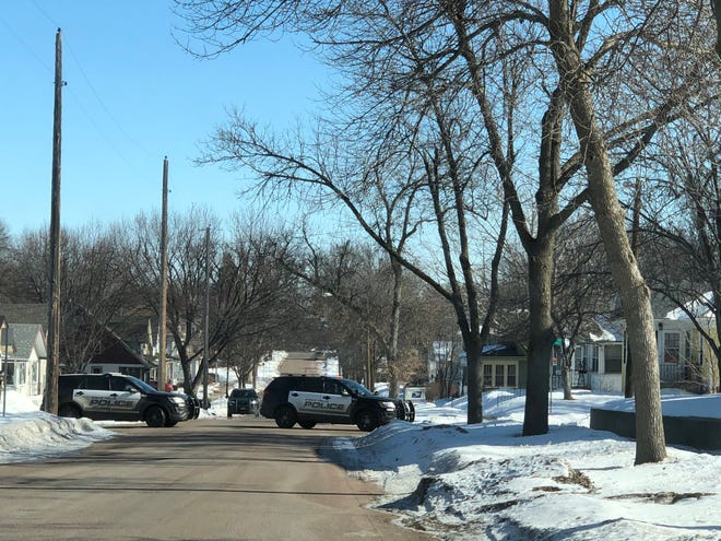 Police blocked off a section of a central Sioux Falls neighborhood on Thursday afternoon as they searched for a suspect after a foot pursuit.