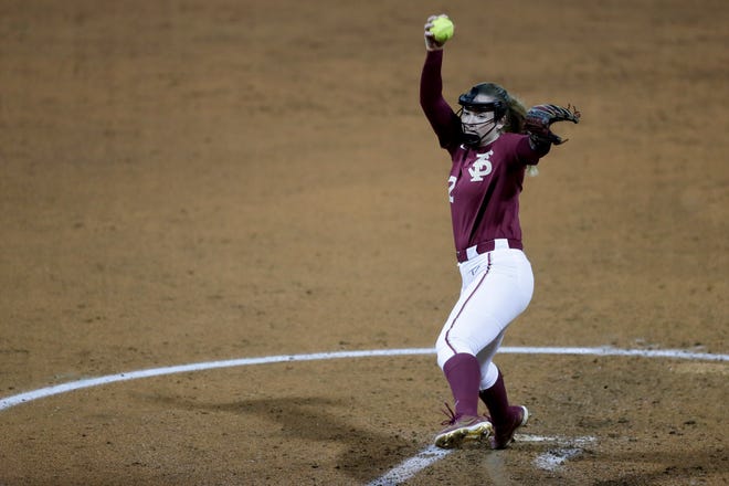 Florida State University's Caylan Arnold (12) pitches during a game between Florida State and Florida A&M University at JoAnne Graf Field Wednesday, Feb. 12, 2020. 