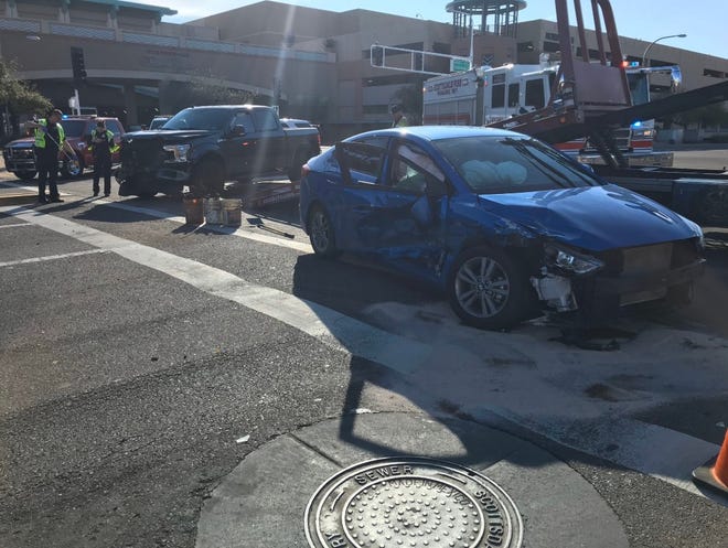 A crash between two vehicles near Camelback Road and Goldwater Boulevard in Scottsdale on Feb. 14, 2020 left three people injured, including a pedestrian.