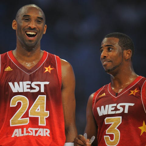 Kobe Bryant, left, and Chris Paul enjoy a laugh du