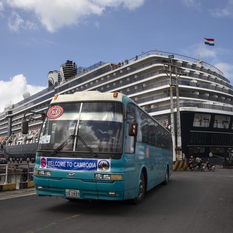 Excited passengers arrive from the MS Westerdam cr