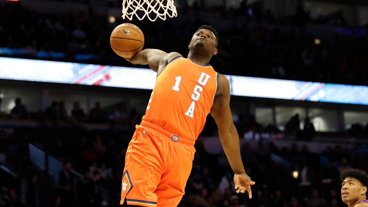 Zion Williamson throws down one of his numerous dunks during the Rising Stars Challenge.