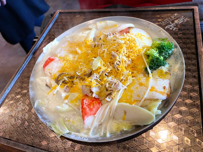 Mesa의 Tasty Pot에 있는 뜨거운 우유 치즈 수프.