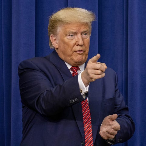 President Donald Trump delivers remarks to members