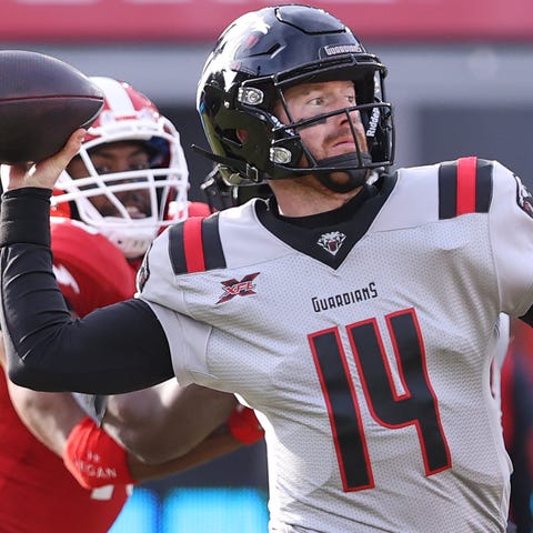 NY Guardians quarterback Matt McGloin (14) passes 