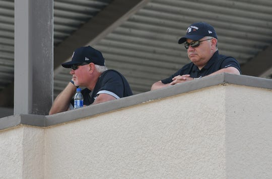 From left, Tigers manager Ron Gardenhire and general manager Al Avila watch the action on the fields from overhead at Detroit Tigers spring training.