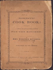 The cover of the "Domestic Cook Book" by Malinda Russell, published by the author in 1866.