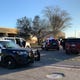 Police cars line Stadem and Tempe drives as officials investigate after a body was found in an office building on Feb. 17, 2020.