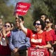Judy Robbins, a special education teacher at Mesa Public Schools, cheers during a #RedForEd rally at the Arizona State Capitol in Phoenix on Monday, Feb. 17, 2020. Invest In Ed is throwing a rally for the kickoff of collecting signatures for its ballot initiative.
