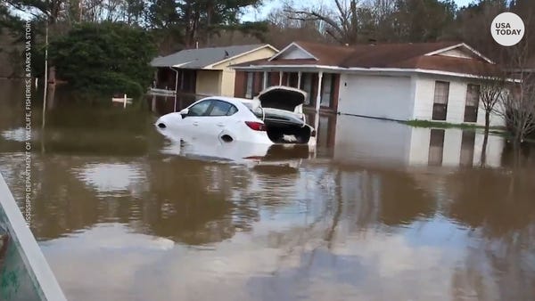 Flooding swamps Mississippi as people told to 'get
