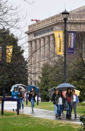 Students move between classes on Lipscomb University's campus in Nashville, Tenn., on Tuesday, Feb. 18, 2020.