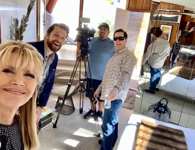 Sandie Newton, Danny Heller and Kip Serafin smile for a selfie as Edward Luna, NBC Palm Springs' chief photographer, sets up.