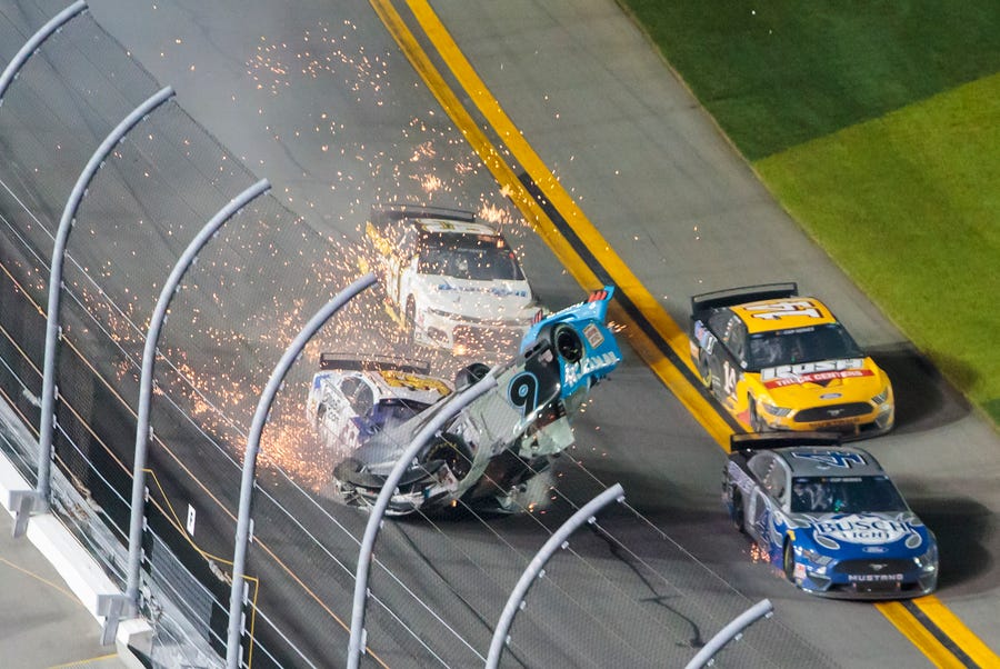 NASCAR Cup Series driver Ryan Newman (6) goes airborne after being hit by Corey LaJoie (32) on the last lap of the Daytona 500 at Daytona International Speedway.
