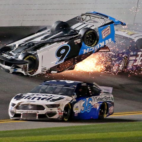 Ryan Newman's overturned No. 6 Ford is hit by Core