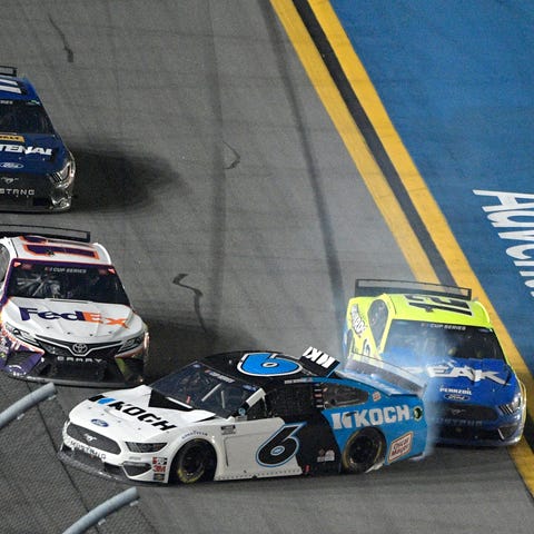 Ryan Newman (6) gets turned into the wall by Ryan 