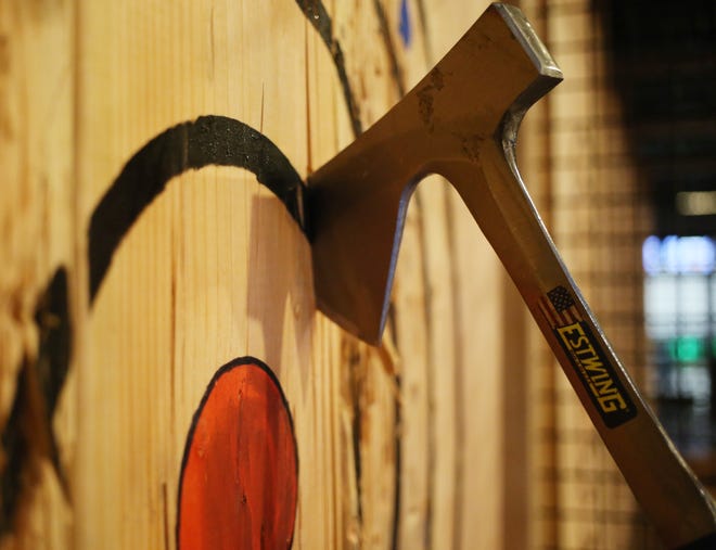 Indoor axe throwing is a popular activity around the country.