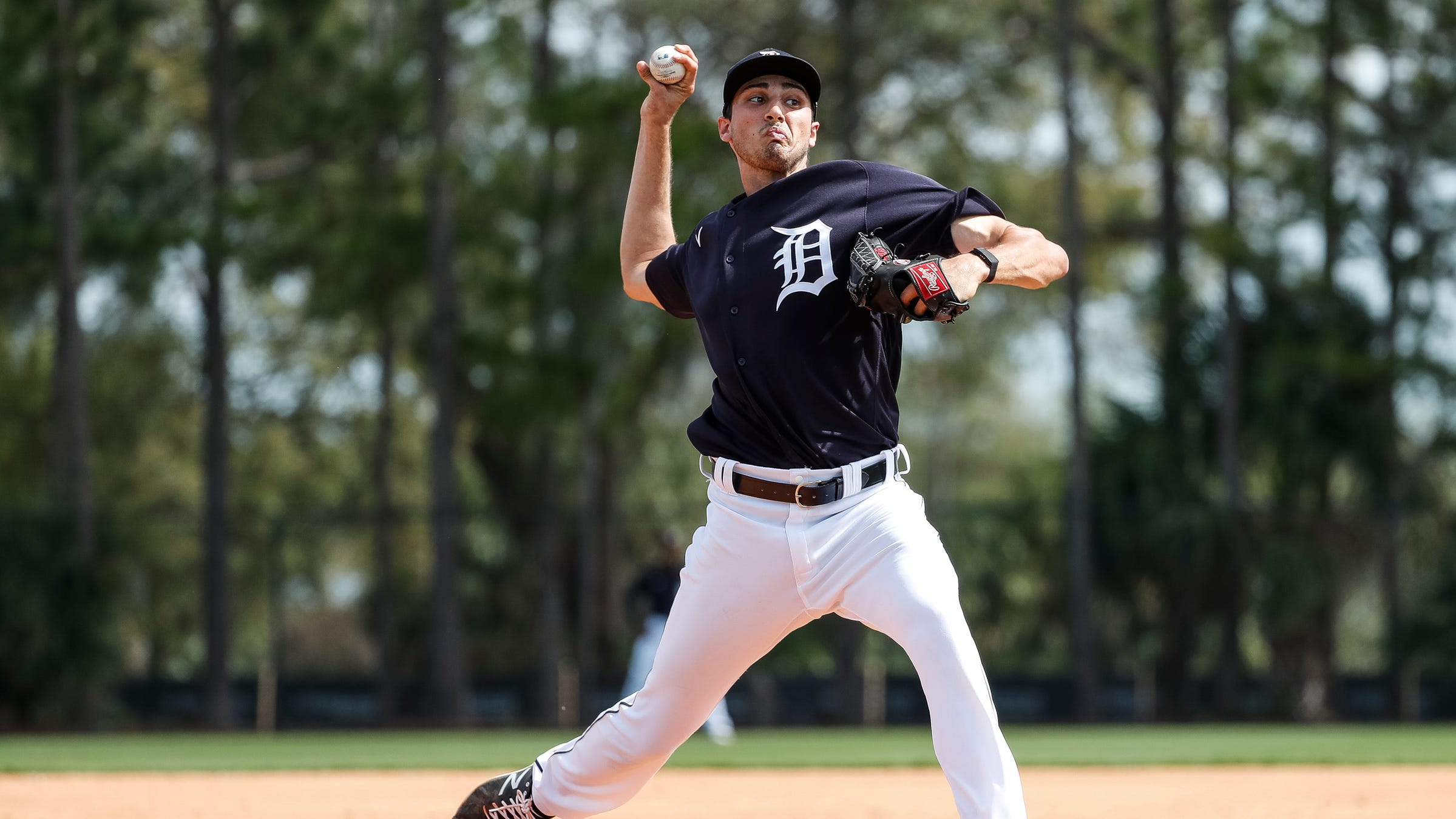 Pitcher Alex Faedo makes a throw during Detroit Tigers spring training at TigerTown in Lakeland, Fla., Tuesday, Feb. 18, 2020.