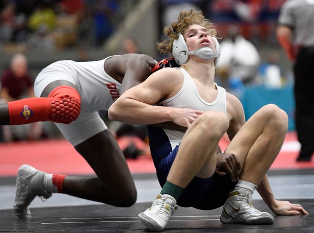 Independence’s Tanner Willett wrestles Roman Evans of Ooltewah during the TSSAA individual wrestling state championships at Williamson Co. Ag Center Thursday, Feb. 20, 2020 in Franklin, Tenn.