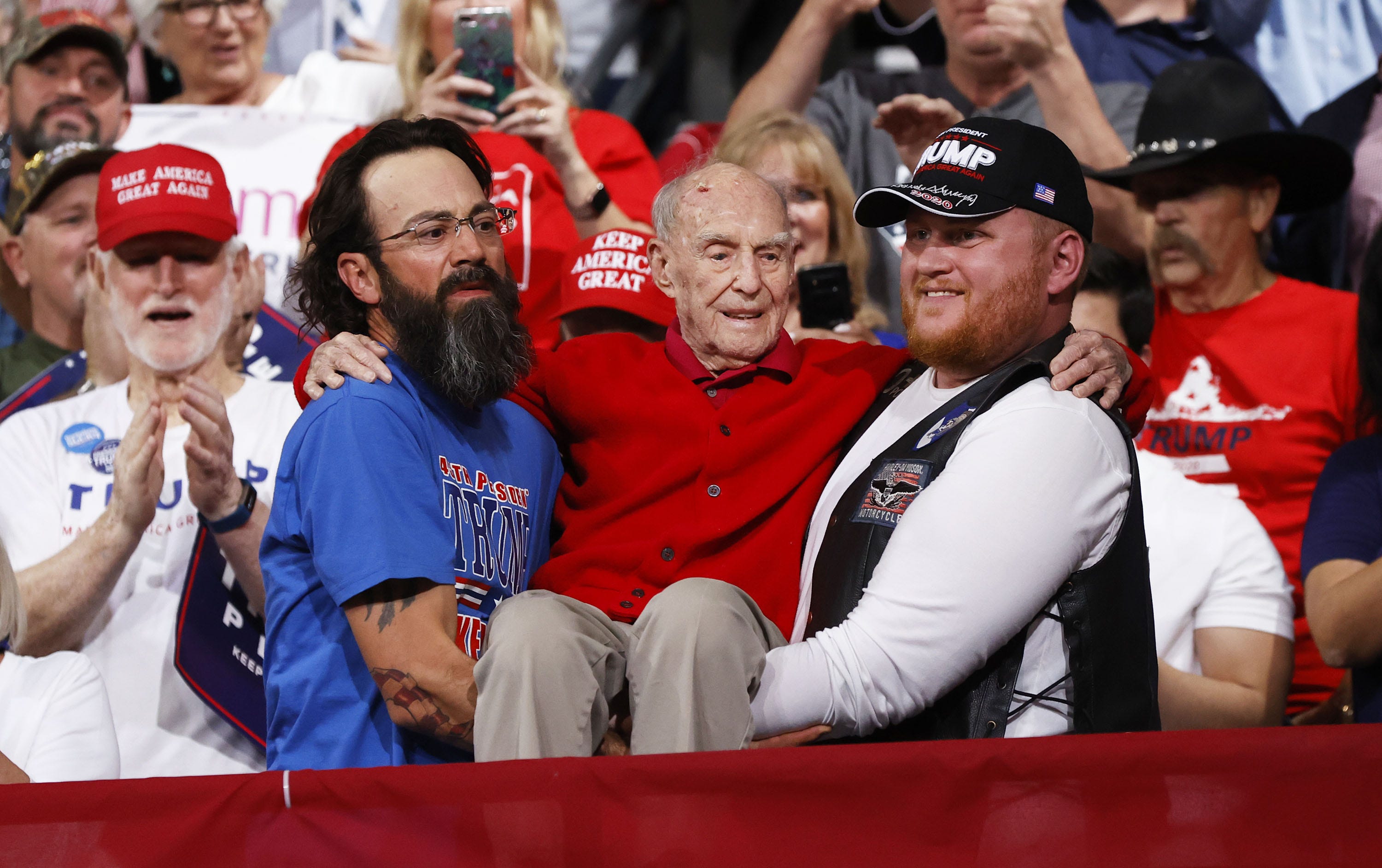 President Donald Trump recognizes a veteran in the crowd at a campaign rally at Veteran's Memorial Coliseum in Phoenix, Ariz. on Feb. 19, 2020.