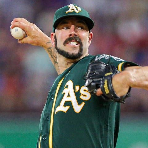 Oakland Athletics starter Mike Fiers (50) throws a