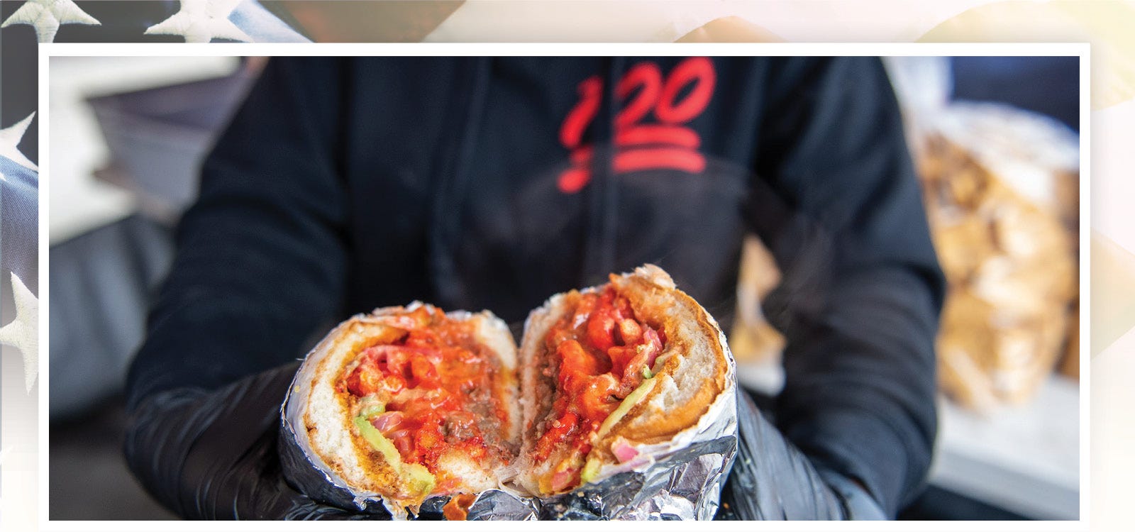 An employee of Orlando Osornio, owner of Tortas Al 100, in Salinas, California, holds the Don Cheeto on Feb. 08, 2020. Osornio's Don Cheeto is one of the most popular items on his menu.